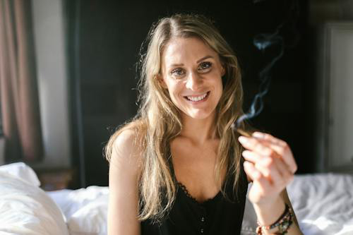 A person smoking as a cannabis event promotion tactic